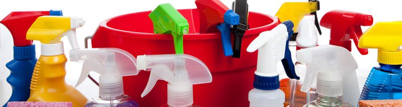 Cleaning supplies in a red bucket on white